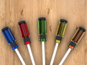 Kolorowe śrubokręty renderujące 3d