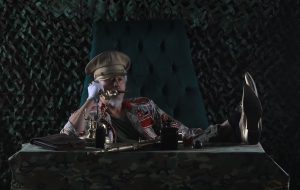 dyktator przy wojskowym stole