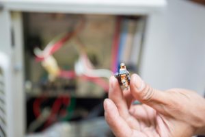 Air Conditioning Repair repairman test checking and repair of magnetic contactor and fixing air conditioning system