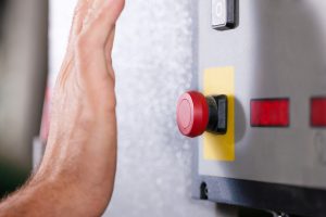 Emergency - Man shutting machine of